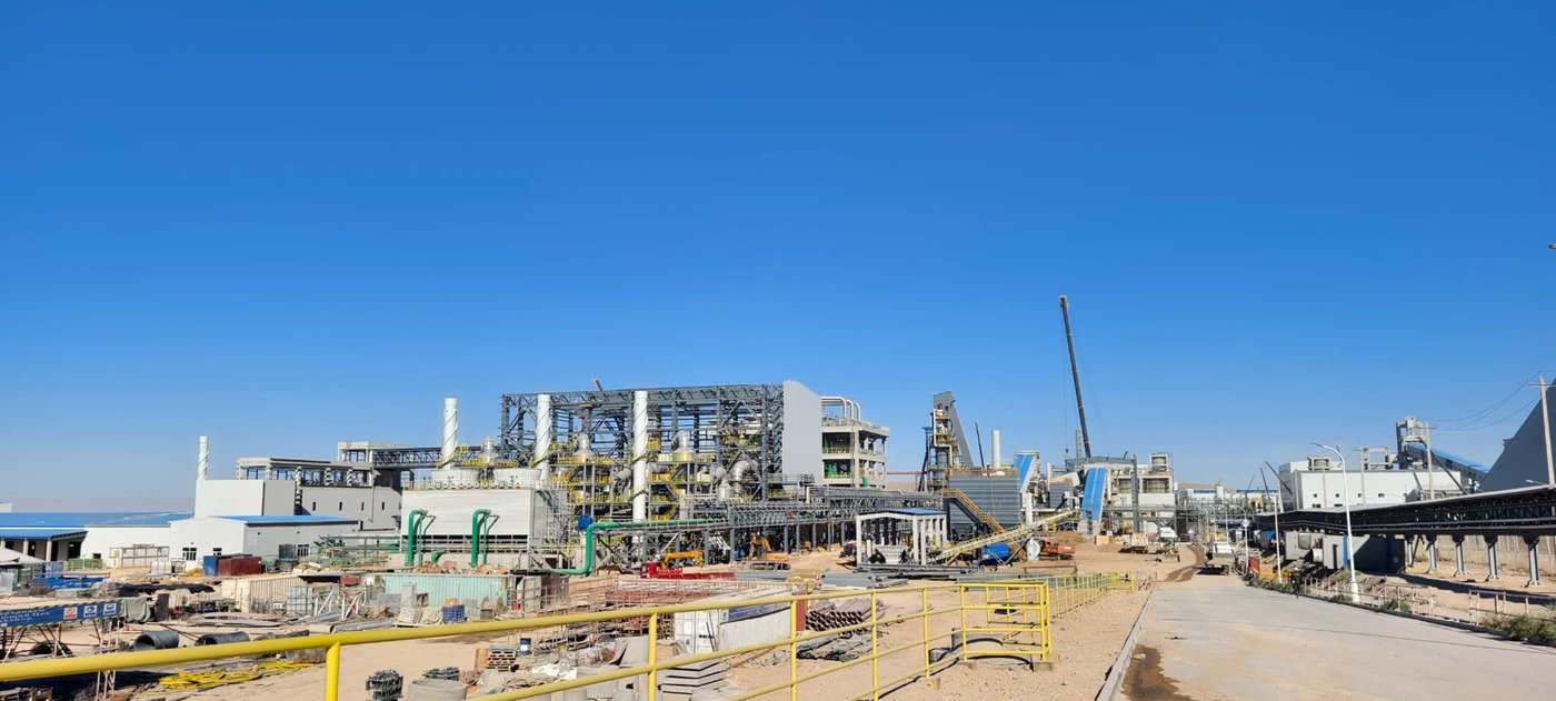 The EuroChem-Karatau fertilizer complex under construction in the Zhambyl Region of Kazakhstan, with conveyor galleries running between the process buildings