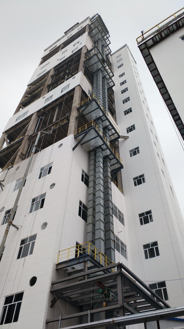 TDG series gas-tight explosion-proof steel cord belt bucket elevator installed at a multi-story chemical plant
